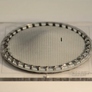 An initially flat sheet is conformed to a curved 3D printed surface. As an incision in the sheet grows, the curvature of the sheet governs the fracture phenomenology.